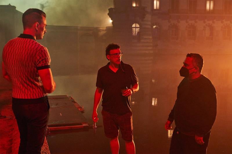 Chris Evans as Lloyd Hansen with 'The Gray Man' directors Anthony and Joe Russo. 