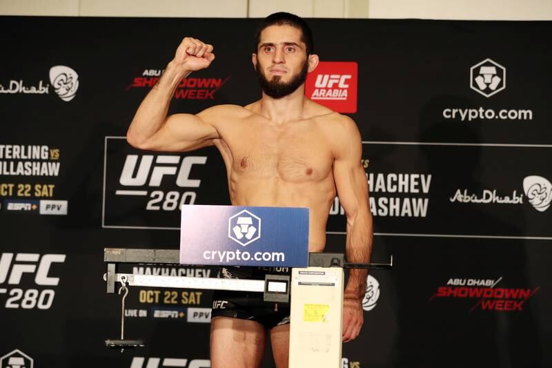 Islam Makhachev weighs in before his lightweight title fight at UFC 280 against Charles Oliveira in Abu Dhabi. Both fighters weighed an identical 154.5lbs. Chris Whiteoak / The National