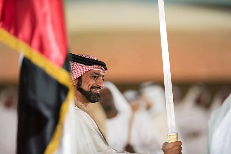 Sheikh Ammar bin Humaid Al Nuaimi, Crown Prince of Ajman, dances. Mohamed Al Suwaidi  / Crown Prince Court - Abu Dhabi