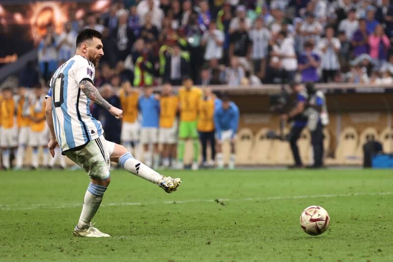 Lionel Messi scores for Argentina in the penalty shoot-out. Getty