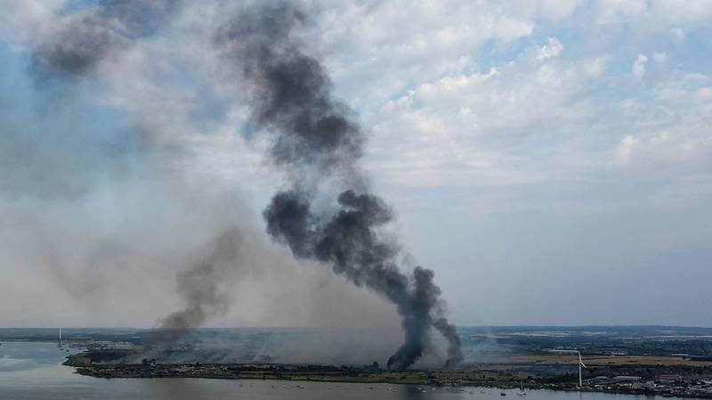 Smoke columns rise from Dartford, Kent, where a fire erupted earlier in the day. AFP