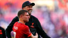 Liverpool midfielder James Milner signs new one-year deal 