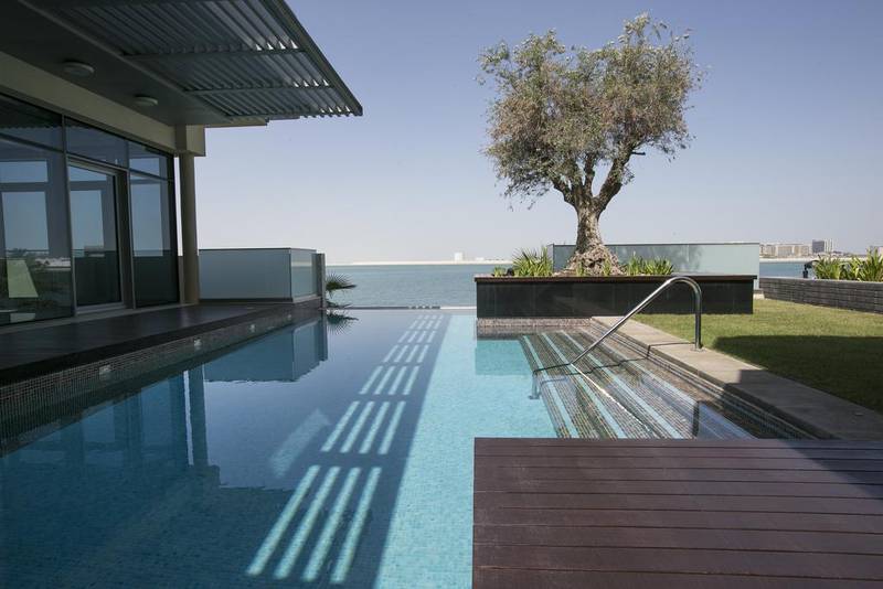 Installing a pool like this one at a five-bedroom villa in Al Muneera in Abu Dhabi will add aesthetic and financial value to your home. Mona Al Marzooqi / The National