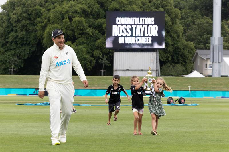 Ross Taylor walks off the pitch for the last time in a Test match with his children after New Zealand defeated Bangladesh in Christchurch on Monday, January 11. AFP