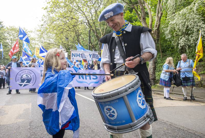 Supporters of Scottish independence take part in a rally in Glasgow. PA
