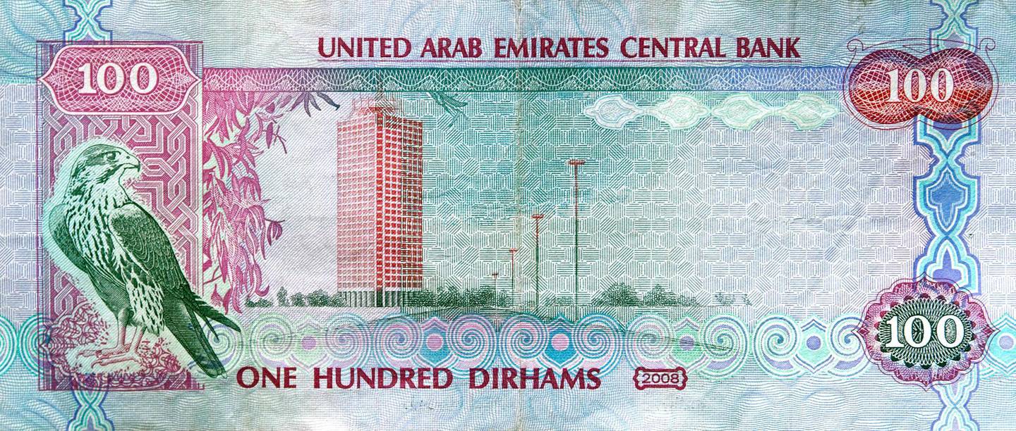 Dubai, August 16, 2011 - A 100 dirham note in Dubai, August 16, 2011. (Jeff Topping/The National) STOCK