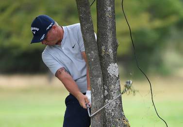 BIRMINGHAM, ENGLAND - AUGUST 01: Callum Shinkwin of England brakes his club whilst playing his second shot behind a tree on the third hole during Day three of the Hero Open at Marriott Forest of Arden on August 01, 2020 in Birmingham, England. (Photo by Ross Kinnaird/Getty Images)