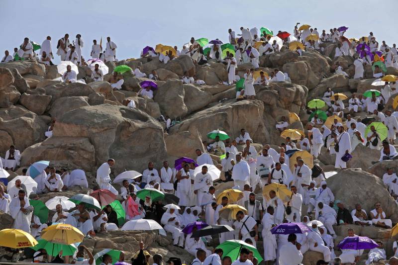 Pilgrims gather to pray atop Mount Arafat. AFP