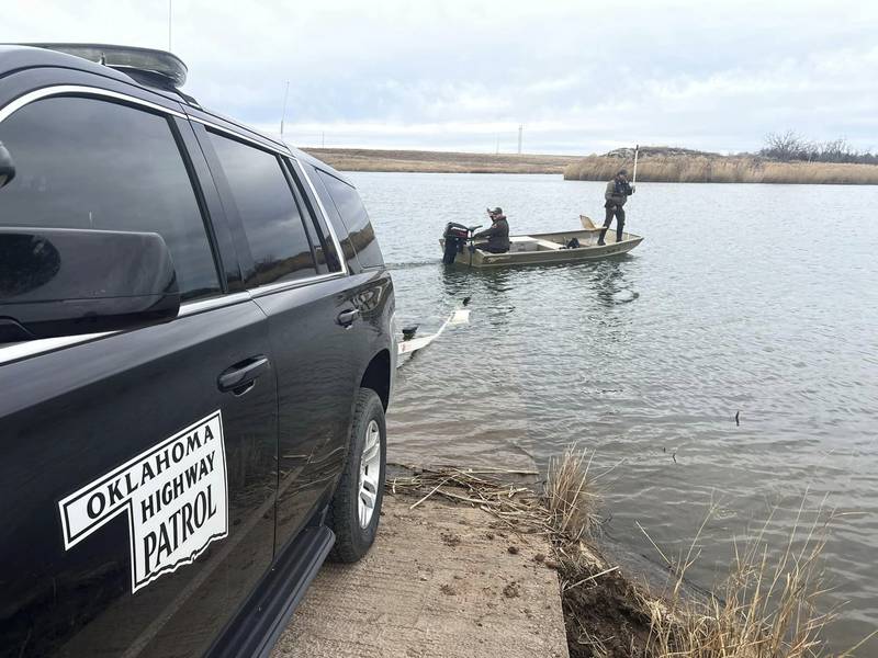 Troopers search a pond near Cyril, Oklahoma, for Athena Brownfield, 4. Oklahoma Highway Patrol / AP