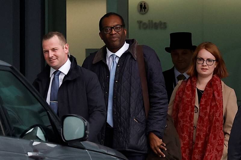 Mr Kwarteng leaves Heathrow Airport in London, before travelling to Downing Street. Reuters