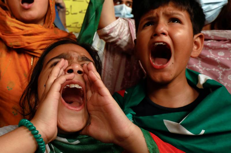 Young supporters of Mr Khan express their anger during a rally in Islamabad. Reuters