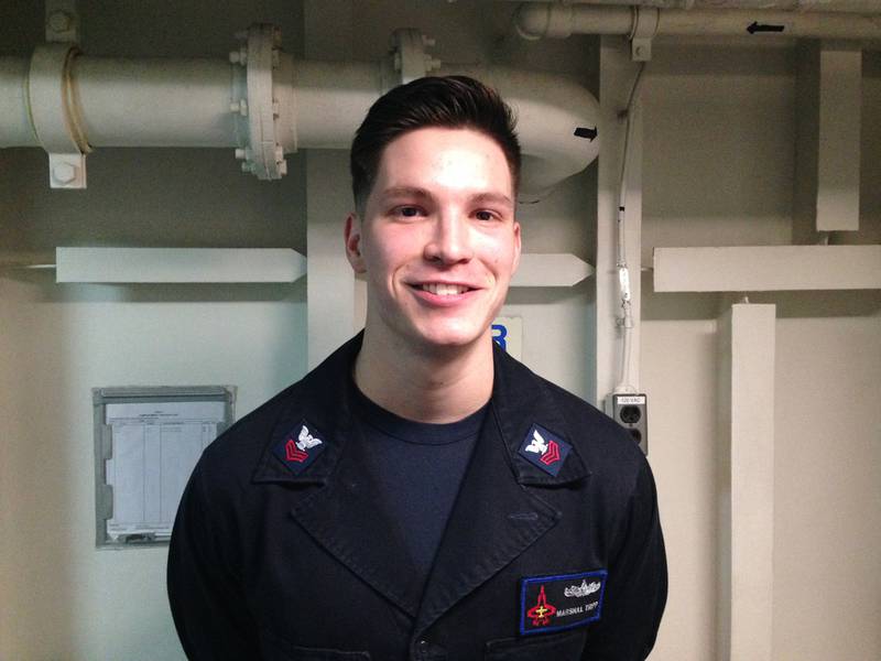 US navy Petty Officer First Class Marshall Tripp, 23, a diesel mechanic on the aircraft carrier.