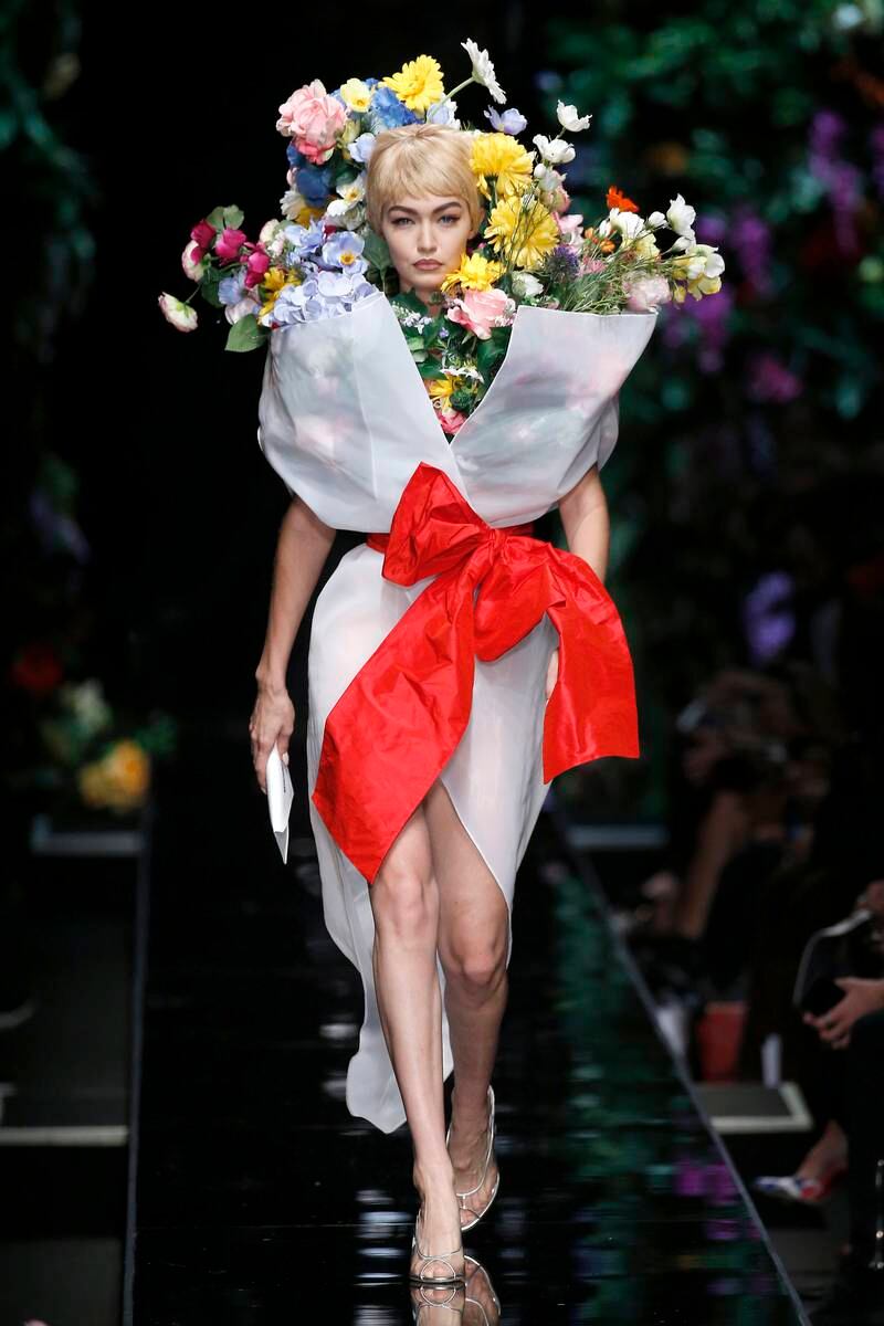 Gigi Hadid transformed into a living bouquet during Moschino's spring/summer 2018 show. Getty Images