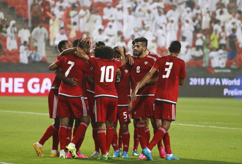 UAE players celebrate after scoring against Malaysia. Karim Sahib / AFP 

