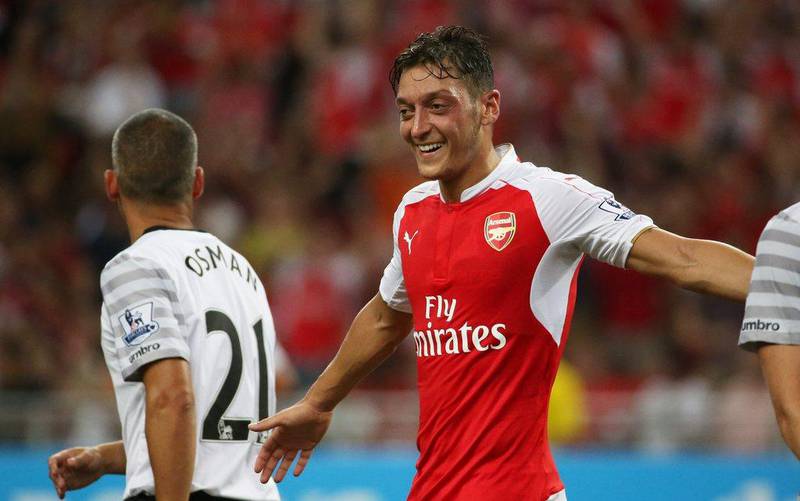 Arsenal's Mesut Ozil celebrates scoring their third goal in a 3-1 win over Everton in the Asia Trophy pre-season tournament final on Saturday in Singapore. Jeremy Lee / Action Images / Reuters / July 18, 2015 