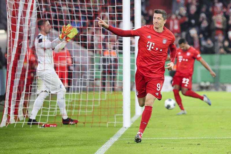 MUNICH, GERMANY - FEBRUARY 05: Robert Lewandowski of FC Bayern Muenchen celebrates after scoring his team`s fourth goal during the DFB Cup round of sixteen match between FC Bayern Muenchen and TSG 1899 Hoffenheim at Allianz Arena on February 5, 2020 in Munich, Germany. (Photo by Christian Kaspar-Bartke/Bongarts/Getty Images)