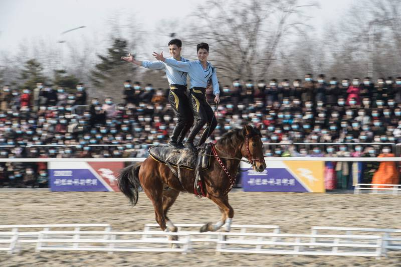 Performers taking part in the opening ceremony of the 2022 Horse Riding Games at the Mirim Riding Club in Pyongyang. AFP