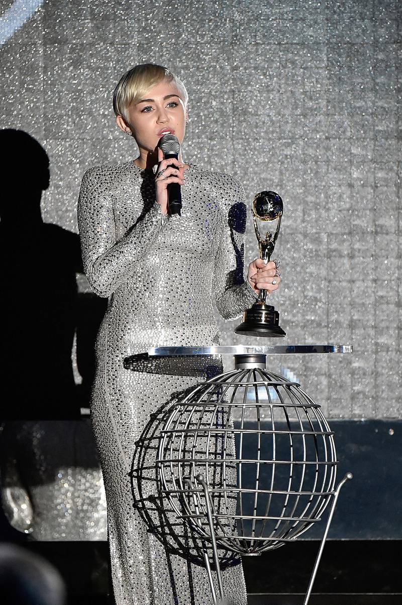 MONTE-CARLO, MONACO - MAY 27:  Miley Cyrus receives a award during the ceremony of the World Music Awards 2014 at Sporting Monte-Carlo on May 27, 2014 in Monte-Carlo, Monaco.  (Photo by Pascal Le Segretain/Getty Images)