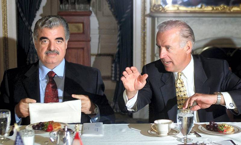 Lebanese Prime Minister Rafiq Hariri (L) attends a meeting with Sen. Joe Biden, (D-DE), and other members of the US Senate Foreign Relations Committee 17 April 2002 at the US Capitol in Washington, DC.     AFP PHOTO / Luke FRAZZA (Photo by LUKE FRAZZA / AFP)