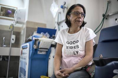 Basra Khoury from the Palestinian West Bank city of Ramallah after an appointment to review her test results a the  the oncology department of the Augusta Victoria Hospital on the Mt. of Olives in east Jerusalem on September 12,2018.She is suffering from breast cancer that has metastasized to her spinal cord .She was too weak to have her chemotherapy session today. 

Last Friday the Trump administration announced cutting aid to Palestinians that slashes funds for cancer patients and others in critical need being treated in the East Jerusalem network of hospitals. The State Department said it was slashing $25 million . US President Donald Trump said that he is pressuring the Palestinians to negotiate a peace deal with Israel .(Photo by Heidi Levine For The National).