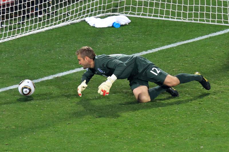 RUSTENBURG, SOUTH AFRICA - JUNE 12:  Robert Green of England misjudges the ball and lets in a goal during the 2010 FIFA World Cup South Africa Group C match between England and USA at the Royal Bafokeng Stadium on June 12, 2010 in Rustenburg, South Africa.  (Photo by Martin Rose/Getty Images)
