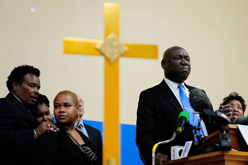 Attorney Benjamin Crump, accompanied by the family of Ruth Whitfield, a victim of shooting at a supermarket, speaks to the media during a news conference in Buffalo, New York. AP