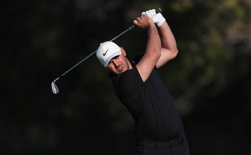 Brooks Koepka plays a shot on the 14th fairway during the first round of the Abu Dhabi Championship. AP Photo
