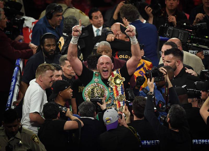 Tyson Fury celebrates after beating Deontay Wilder. AFP