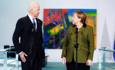 BERLIN, GERMANY - FEBRUARY 1:  U.S. Vice President Joe Biden and German Chancellor Angela Merkel speak to the media prior to talks at the Chancellery on February 1, 2013 in Berlin, Germany. The two are meeting ahead of the Munich Security Conference, which takes place from February 1-3. (Photo by Christian Marquardt-Pool/Getty Images)