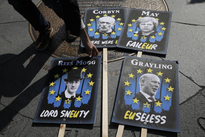 LONDON, ENGLAND - APRIL 1:  Anti-Brexit placards lie on the ground in front of the Houses of Parliament on April 1, 2019 in London, England. MPs in Parliament will vote on alternative arrangements for Brexit in a series of indicative votes tonight after Mrs May's deal was defeated for a third time in the House of Commons last week.(Photo by Dan Kitwood/Getty Images) *** BESTPIX ***