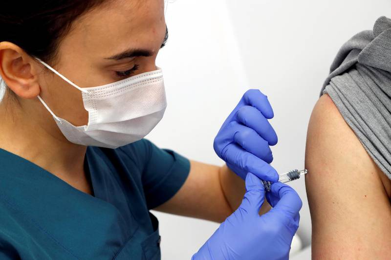 A volunteer is injected with an experimental Chinese Covid-19 vaccine as Turkey began final Phase III trials at Kocaeli University Research Hospital in Kocaeli, Turkey. Reuters