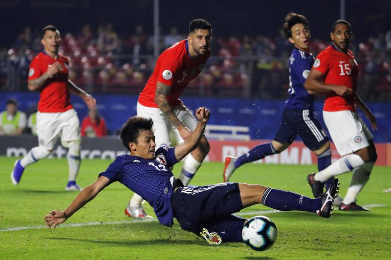 Takefusa Kubo , centre, misses a chance near the end of the match. EPA