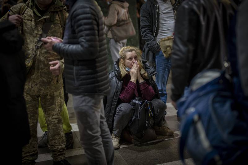 An anxious wait to board a train to leave Kiev as the attack loomed. AP Photo