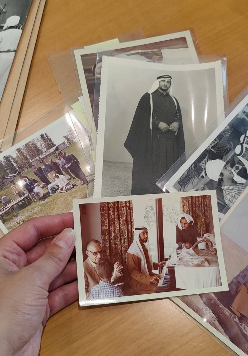 Archivist, Jasmine Soliman, rehousing the H.E. Butti bin Bishr Collection in archival sleeves. Copyright Jasmine Soliman