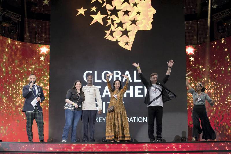 Some of this year's finalists in the Global Teacher Prize take to the stage. Courtesy: Global Education & Skills Forum