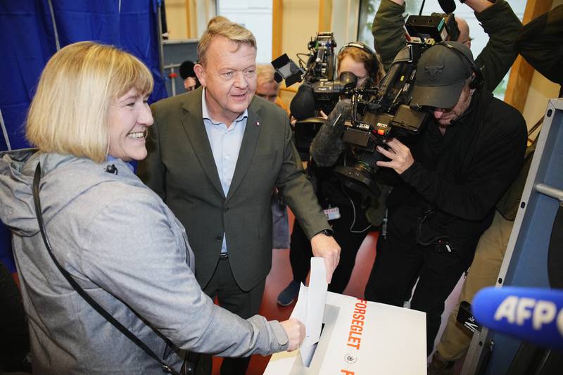 Leader of the Moderate Party Lars Loekke Rasmussen and his wife Solrun vote at Nyboder School in Copenhagen. Reuters