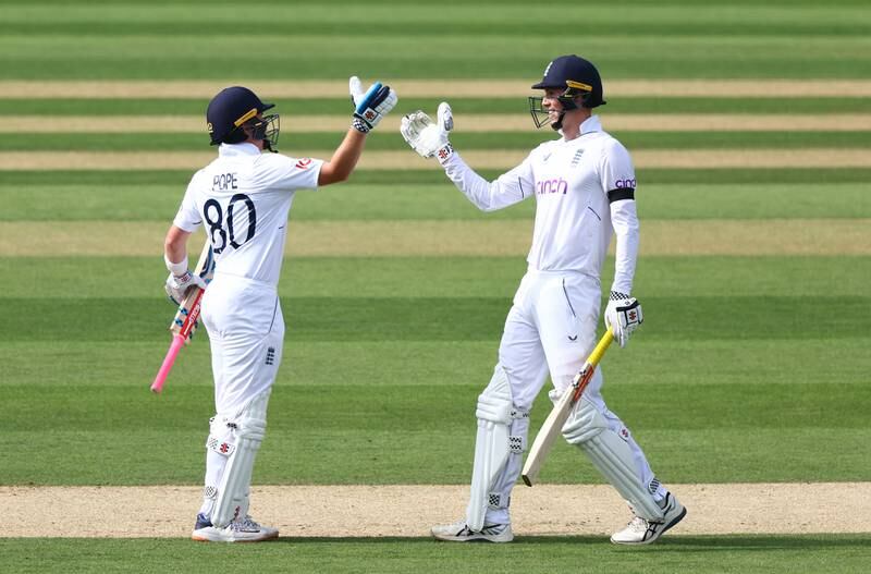 England batsmen Zak Crawley, right, and Ollie Pope celebrate victory. Getty 