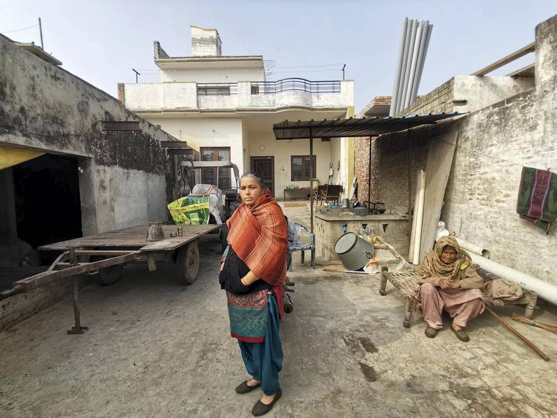 Sukhvir Kaur, 40, from Rauni village in Ludhiana is juggling between household chores and managing farms and finances for the first time in life to fill in her husband Balwinder Singh’s shoes as he is protesting against the new farm laws at Singhu border since November 26. Taniya Dutta for The National