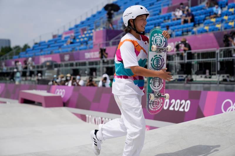 Gold medal winner Momiji Nishiya of Japan walks off the course after winning the women's street skateboarding finals.