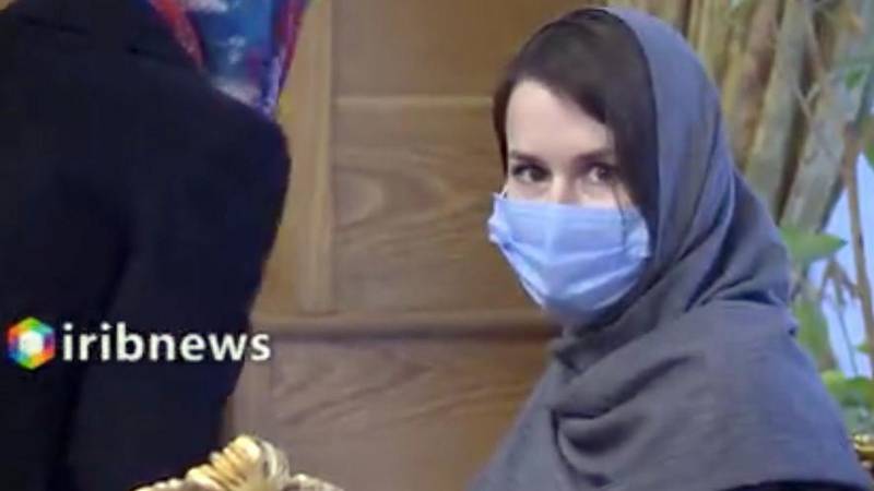 epa08841624 A handout video grab taken from a video from Iran state TV (IRIB) shows, dual British-Australian citizen Kylie Moore-Gilbert during a prisoner swap at the Mehr-Abad airport in Tehran, Iran, 25 November 2020. Media reported that Moor-Gilbert has been released in exchange with three Iranian prisoners abroad, as she was sentenced to 10 years jail in Iran.  EPA/IRIB HANDOUT BEST QUALITY AVAILABLE HANDOUT EDITORIAL USE ONLY/NO SALES