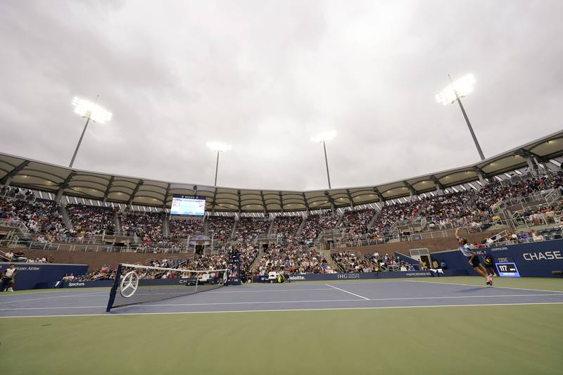 Peter Gojowczyk, of Germany, right, returns against Carlos Alcaraz, of Spain, during the fourth round of the US Open. AP