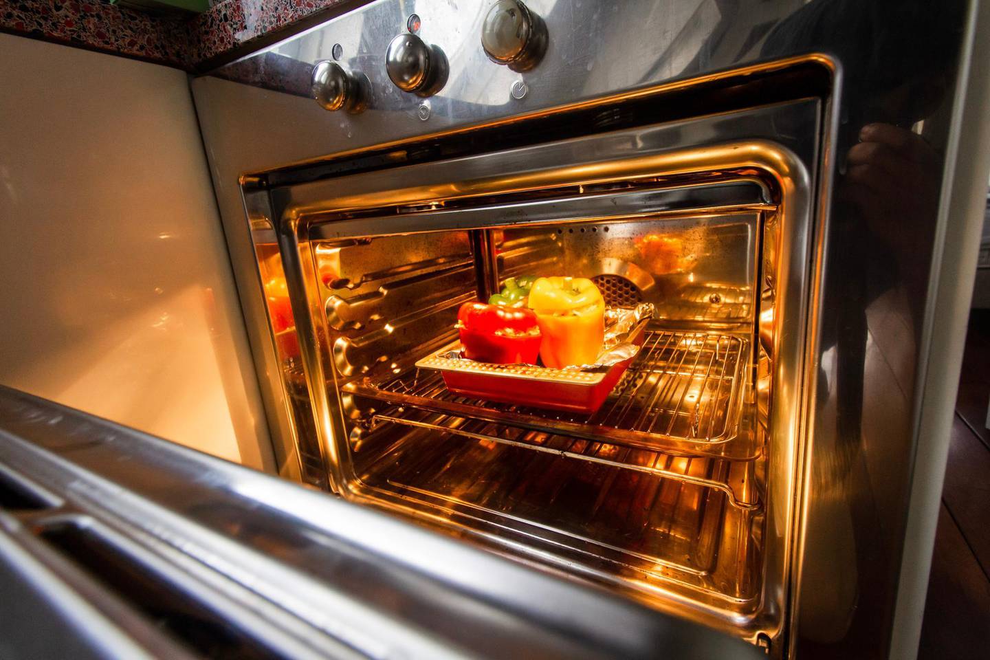 Give your oven a sparkling makeover with an at-home cleaning service. Unsplash