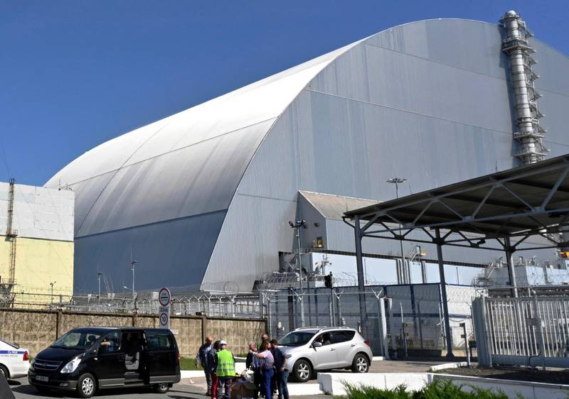 FILE - This June 1, 2019, file photo shows a view of the New Safe Confinement (NSC) movable enclosure at the nuclear power plant in Chernobyl, Ukraine. A new structure built to confine the Chernobyl nuclear reactor at the center of the world's worst nuclear disaster has been previewed for the media. (Sergei Supinsky/Pool Photo via AP, File)