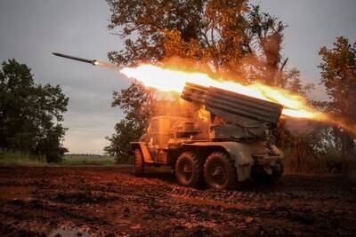 Ukrainian troops fire a BM-21 Grad multiple rocket launcher near the front line in Donetsk region. Reuters