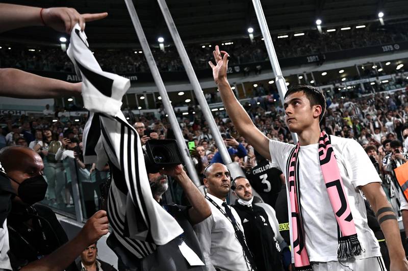 Juventus forward Paulo Dybala waves to supporters. AFP