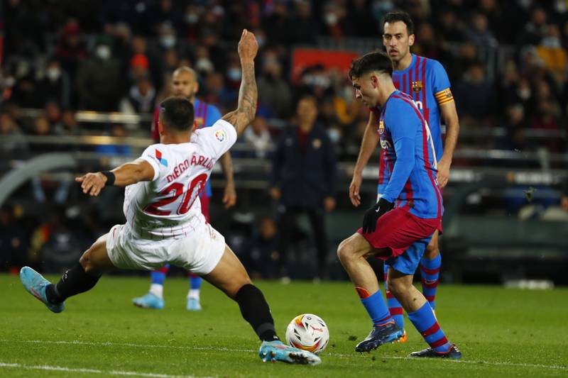 Pedri controls the ball before scoring the opening goal for Barcelona against Sevilla. AP