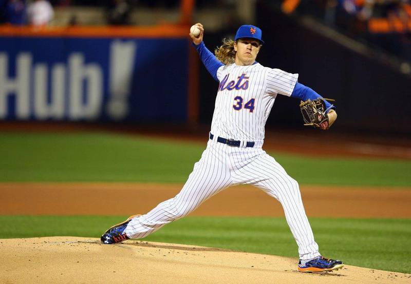 Noah Syndergaard of the New York Mets pitches in the first inning against the Kansas City Royals during Game 3.   Mike Stobe / Getty Images



