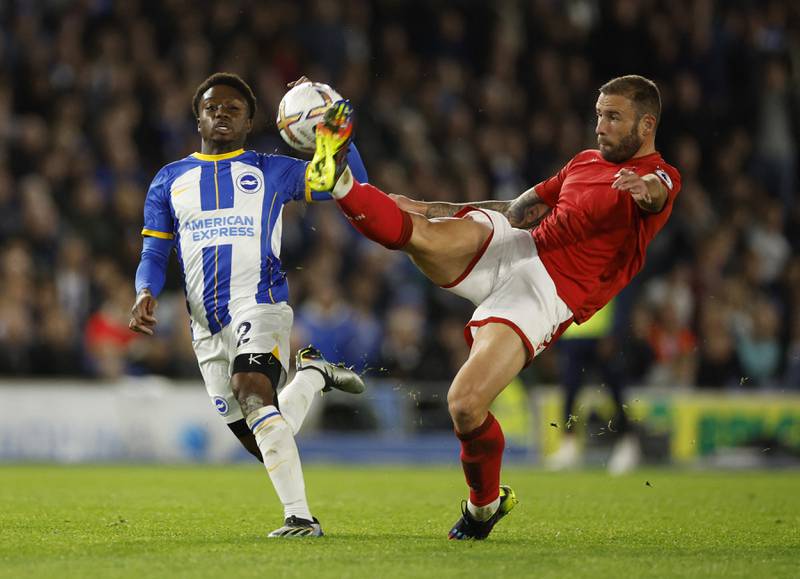 Brighton & Hove Albion's Tariq Lamptey in action with Nottingham Forest's Steve Cook. Reuters