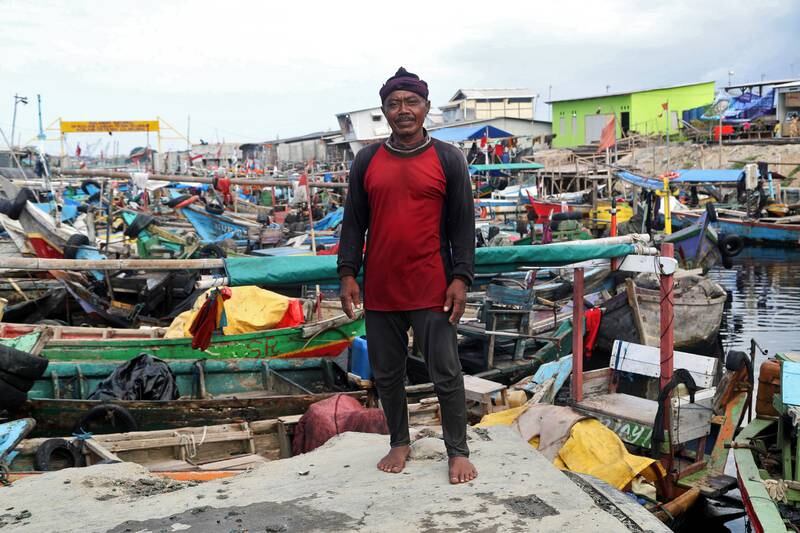 Charmani, 52, is a fisherman who dives to gather various shellfish