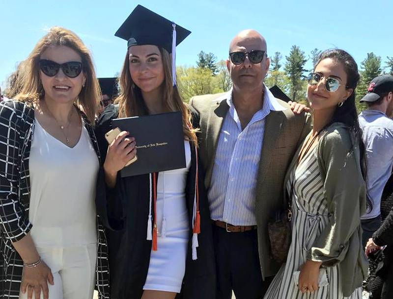 In this May 2019 file photo provided by Guila Fakhoury, her father Amer Fakhoury, second right, gathers with family members at the University of New Hampshire in Durham, N.H. U.S. Sen. Jeanne Shaheen, of New Hampshire, is sponsoring a bill, which she is expected to introduce Monday, Feb. 24, 2020, along with Republican Sen. Ted Cruz of Texas, to ban visas and freeze assets of Lebanese officials involved in the detention of Amer Fakhoury. Fakhoury, a restaurant owner in Dover, New Hampshire, who became a U.S. citizen last year,  has been jailed since Sept. 12, 2019, in his native country and has been hospitalized with stage 4 lymphoma. (Guila Fakhoury via AP, File)
